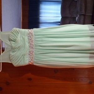 A girls mint green dress. Size 12